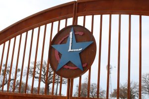 red/white/blue with forced-rusting metal gate